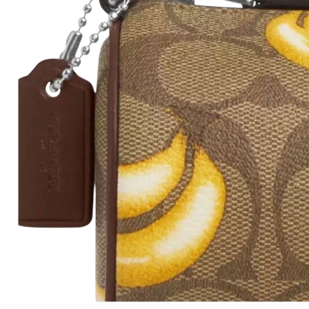 Coach Nolita Barrel Bag In Signature Canvas With Banana Print - Picture 11 of 14